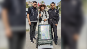 "An Elder from Kazakhstan Completes the First Leg of His Round-the-World Walk"